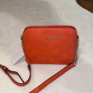 Selling brand new Michael Kors chain bag Nice orange color Great for summer
